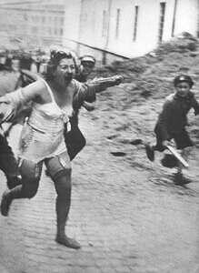 Ukrainian Jewish woman being chased and beaten by ukrainian Nazis during the occupation of Ukraine by Germany Nazis