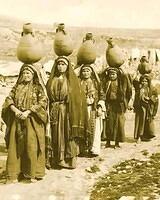 A beautiful photograph of Palestinian women carrying water at Ramallah Palestine in 1890