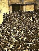Eastern Orthodox ceremony of the “Holy Fire” at the entrance of the church of the holy sepulcher in Jerus