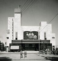 Jaffa Palestine Al Hamra Cinema and the Palestinian flag raised above its building 1937